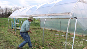 The last step for the roll-up sides is installing the rope hooks and webbing, which adds stability to the side curtains